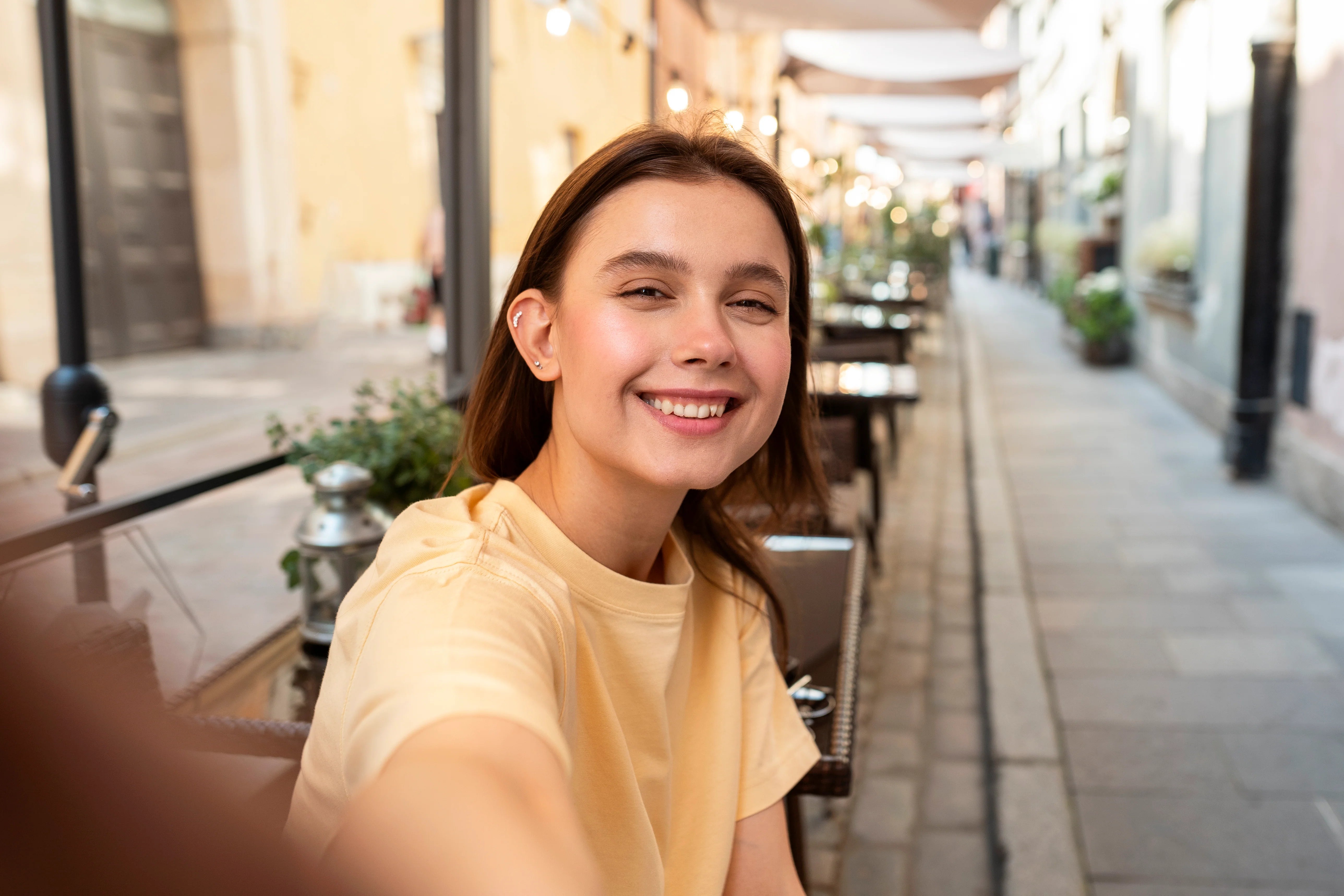 files/medium-shot-smiley-woman-taking-selfie-outside_1.webp