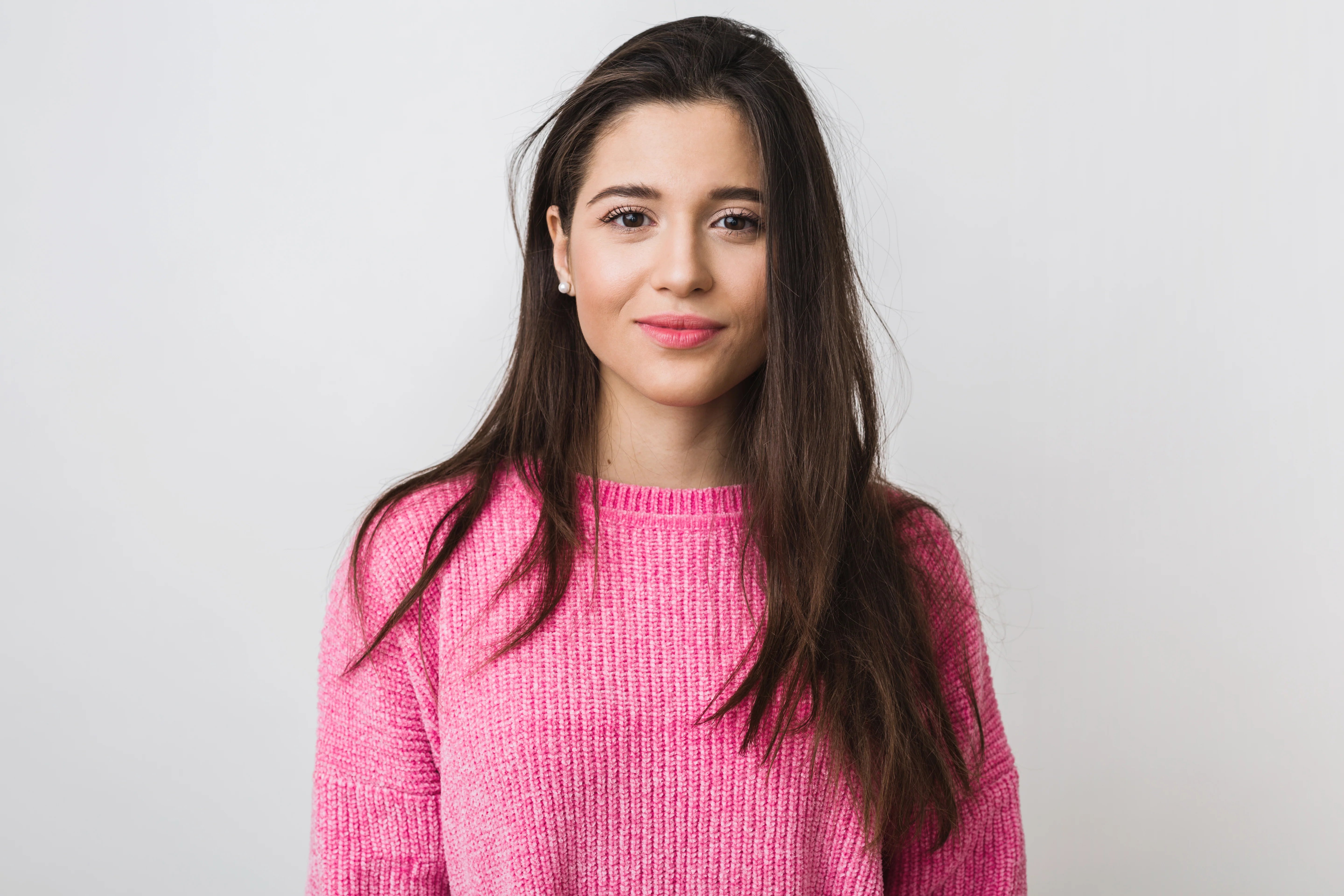 files/young-beautiful-woman-pink-warm-sweater-natural-look-smiling-portrait-isolated-long-hair.webp